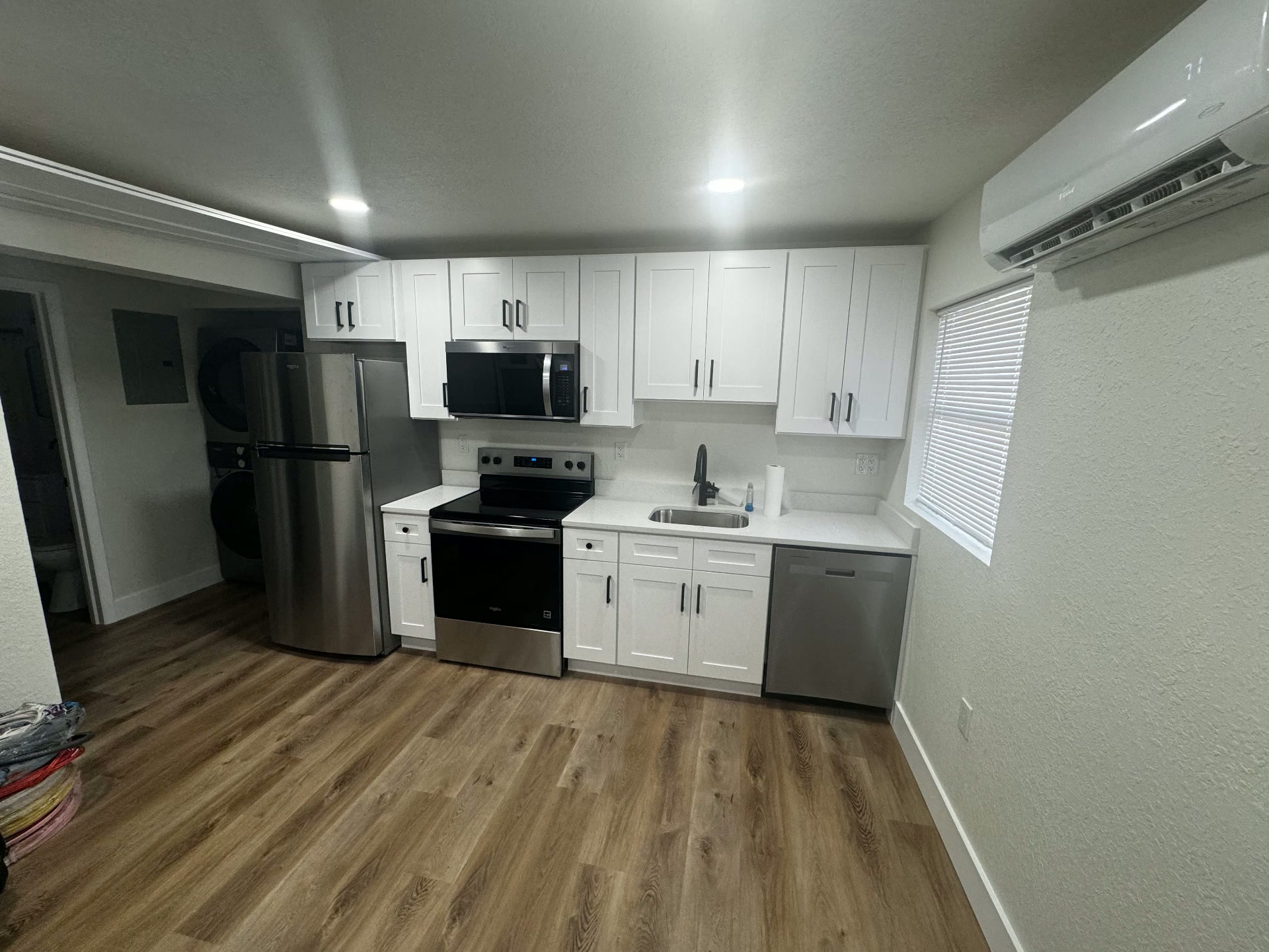 The kitchen of an efficiency apartment available through Wings of Grace housing